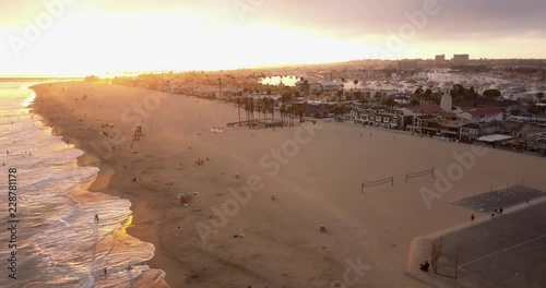 A flight over a Southern California Beach at sunset. photo