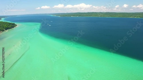 Birds and Boats flying along Torch Lake, MI photo