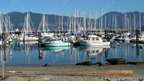 4K: Sailboats on Burrard Inlet near Vancouver with mountain backdrop. photo