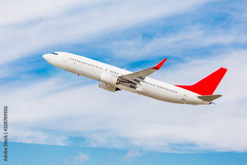 Modern passenger jet aircraft flies in a blue sky. Happy journey and holidays concept. Modern passenger jet aircraft flies in a blue sky. Happy journey and holidays concept.