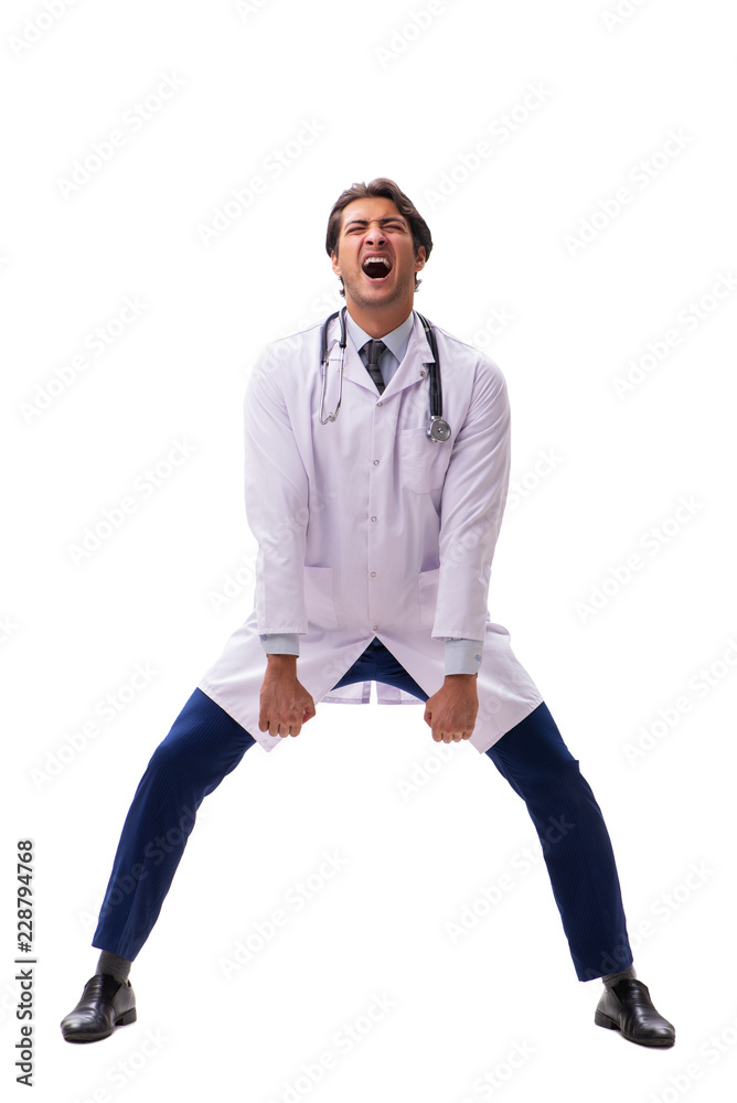 Young handsome doctor under pressure isolated on white Young handsome doctor under pressure isolated on white
