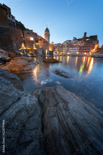 One of the five towns that make up the Cinque Terre region - Vernazza. Great spring sunrise in Liguria, Italy, Europe. Splendid seascape of Mediterranean sea. Traveling concept background.