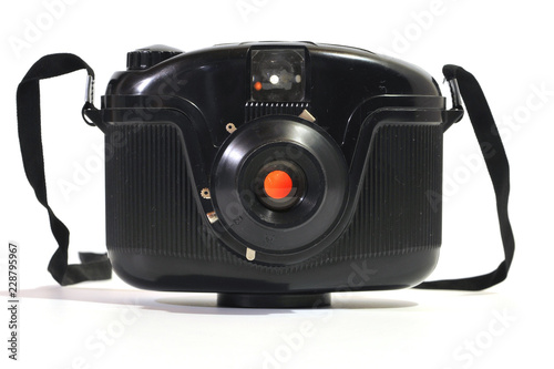 Old plastic 120 film camera isolated on white background