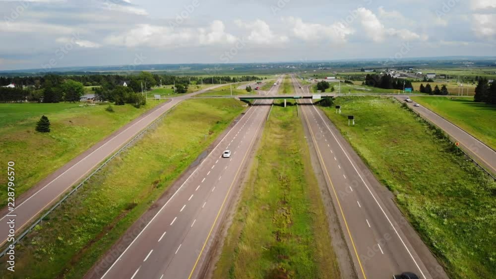 Aerial Of People Travelling On A Long Rural Highway Aerial Of People Travelling On A Long Rural Highway