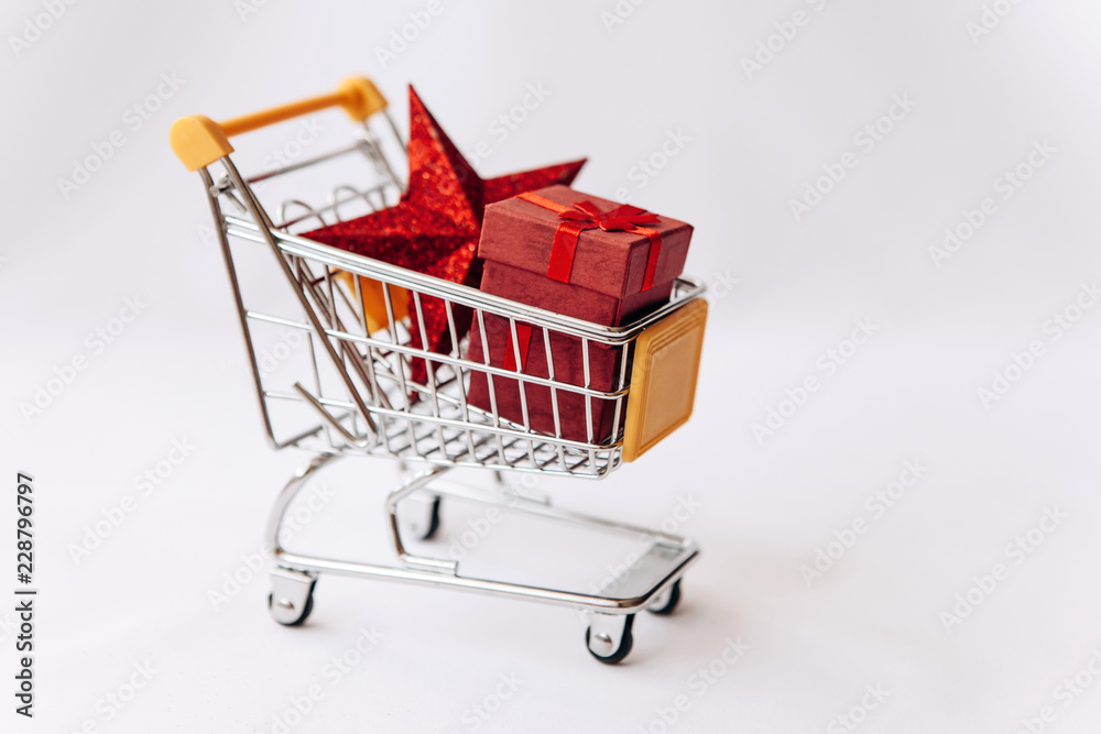 Conceptual photo of Christmas sales or gift shopping. Preparing for the New Year and Christmas. Buying gifts. Conceptual photo of Christmas sales or gift shopping. Preparing for the New Year and Christmas. Buying gifts.