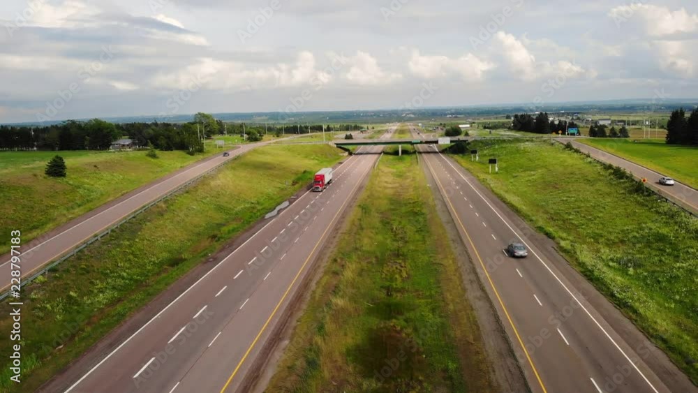 Aerial Of People Travelling On Long Rural Highway Aerial Of People Travelling On Long Rural Highway