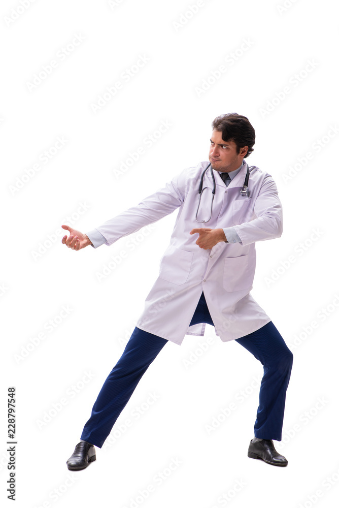 Young handsome doctor under pressure isolated on white Young handsome doctor under pressure isolated on white