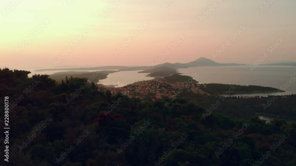 Aerial shot of a beautiful view of Croatian Island Losinj on the sunset - sunrise. Top travel destination. Vacation. Aerial shot of a beautiful view of Croatian Island Losinj on the sunset - sunrise. Top travel destination. Vacation.