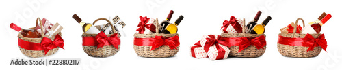 Set with gift baskets and wine on white background