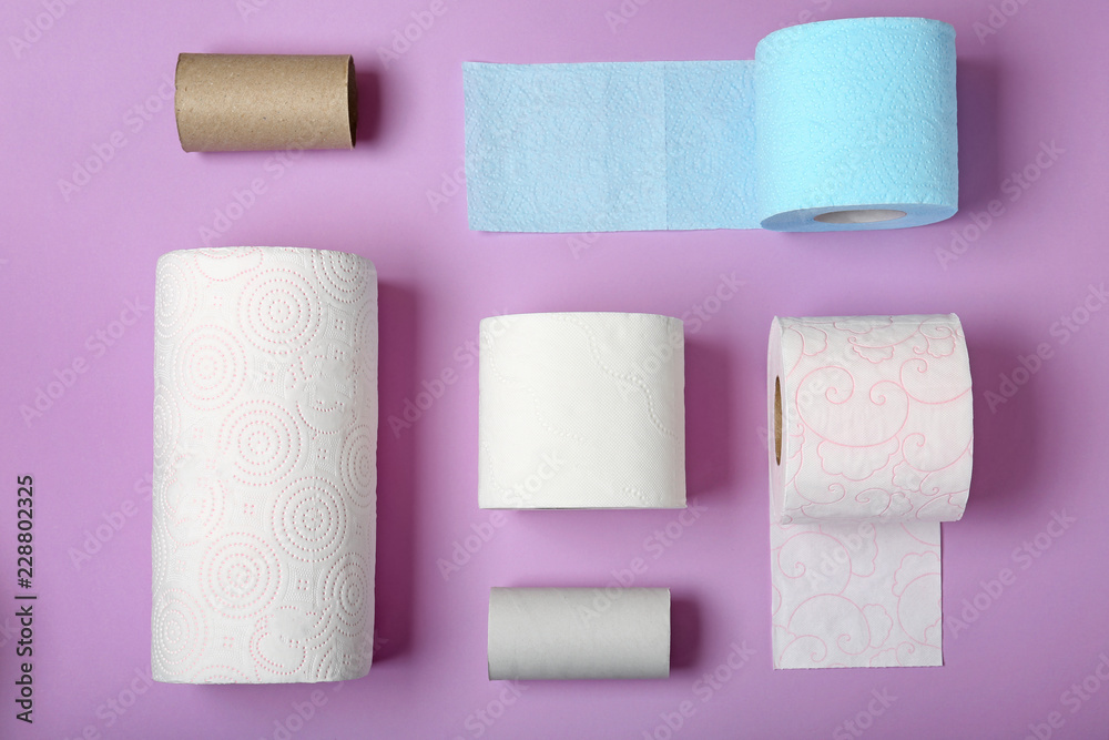 Obraz premium Flat lay composition with toilet paper on color background