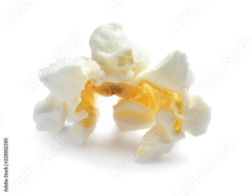 Delicious salty popcorn on white background