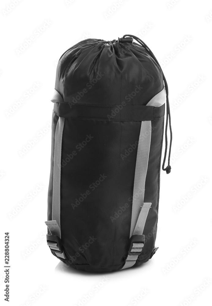 Fototapeta premium Sleeping bag in case on white background. Camping equipment