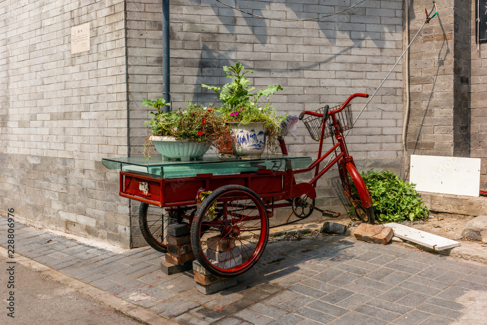 Vintage bike in the narrow alley in a traditional Beijing Hutong in China - 2