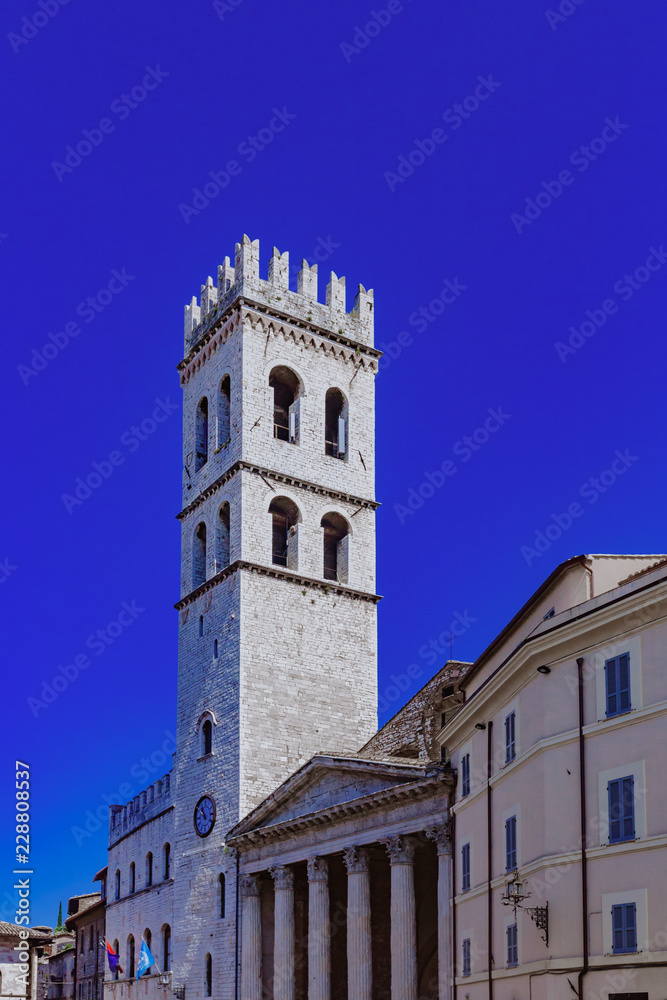 Tower and entrance of Temple of Minerva in Assisi, Italy