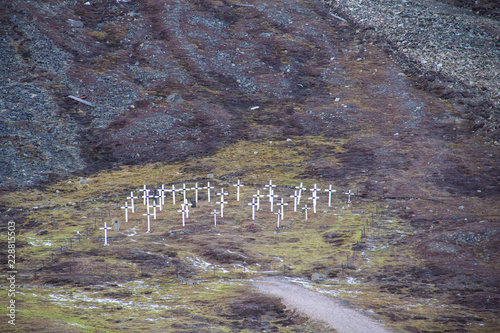 The white crosses of the historic graveyard cemetery, built in 1918 after miners died of the Spanish flu, in Longyearbyen, Spitsbergen, Svalbard, Norway.