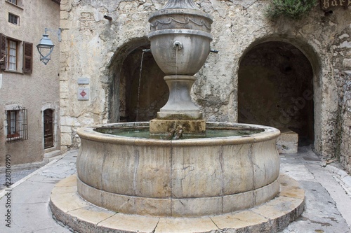 Wallpaper Mural SAINT PAUL DE VENCE, FRANCE - APRIL 24 2017: Big ancient historic fountain in Saint Paul de Vence, France Torontodigital.ca