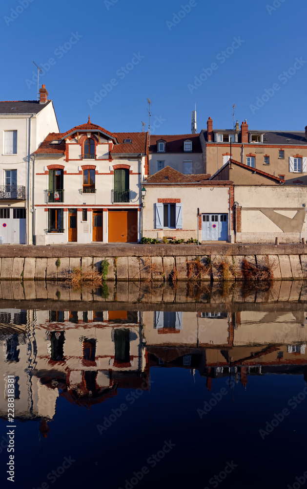 Reflection on the Briare canal in Montargis city
