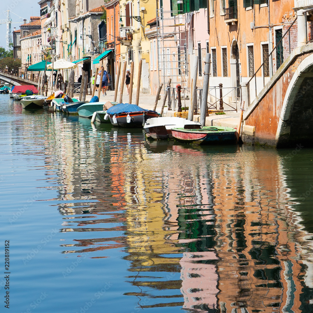 Beautiful view of the scenic canals with ancient buildings of Venice Italy