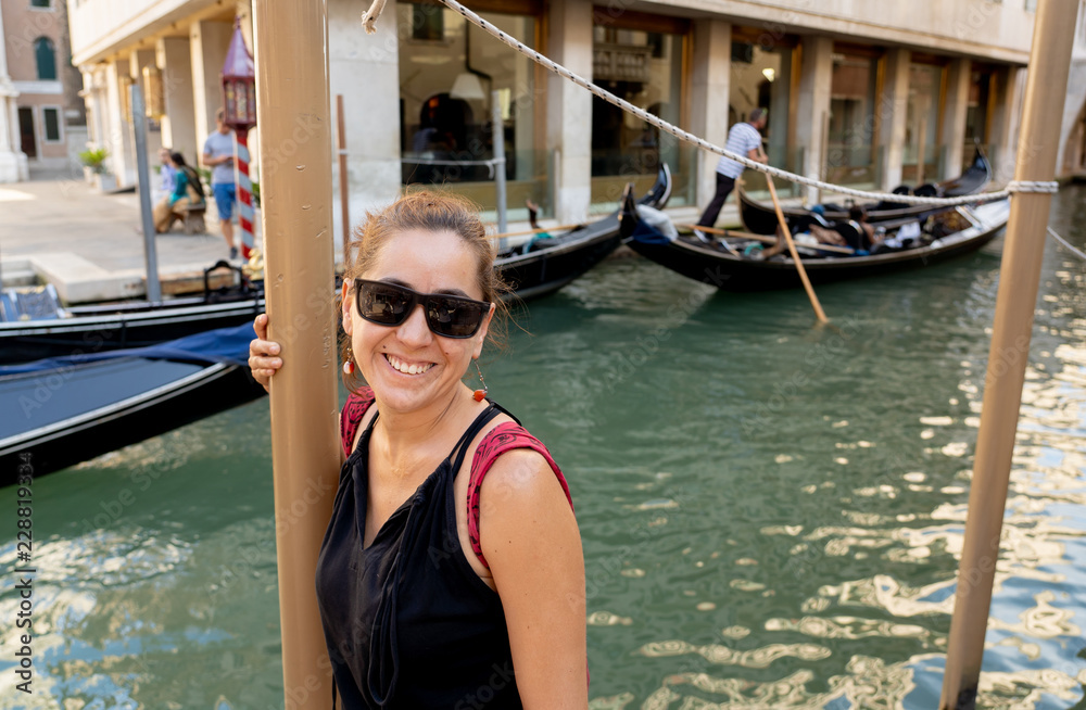 Happy tourist visiting venice city and having fun in Italy