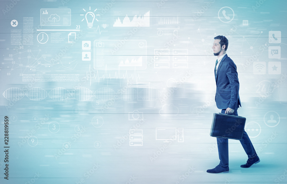 Handsome businessman walking in suit with briefcase on his hand and database concept around
Handsome businessman walking in suit with briefcase on his hand and database concept around
