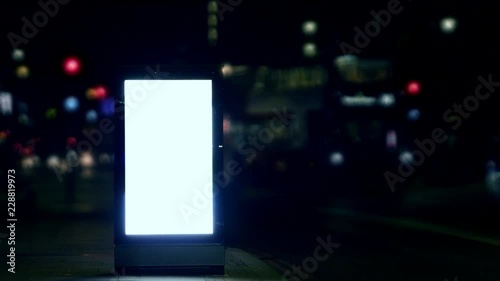 Advertising Street billboard illuminated sign at night
