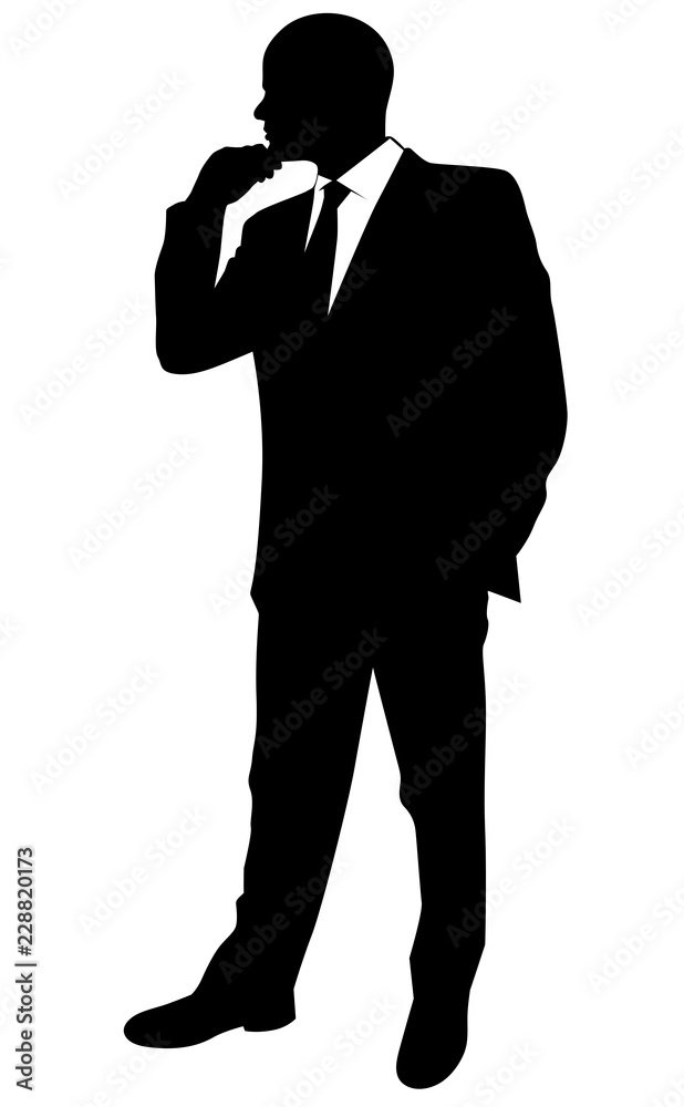 Obraz premium Silhouette of a business man in a suit standing