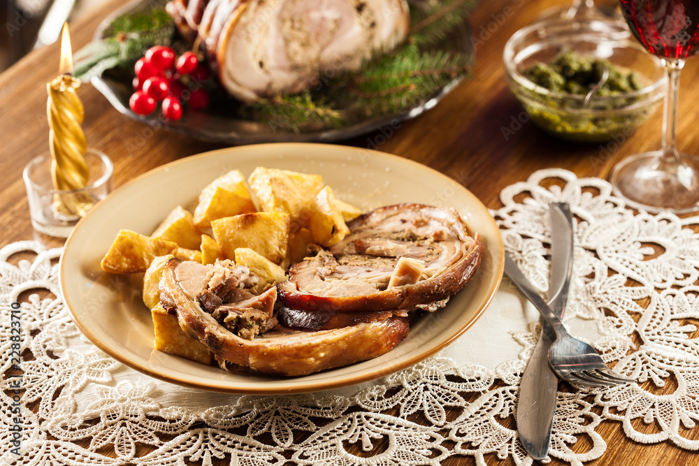 Traditional italian porchetta on festive table Traditional italian porchetta on festive table