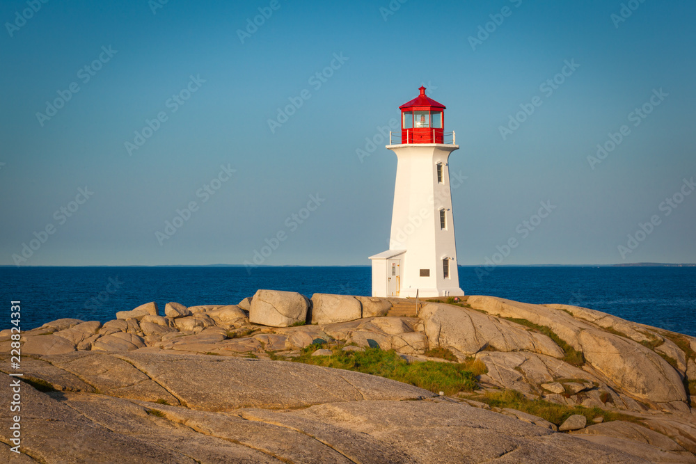 View of Peggy's Cove lighthouse at sunrise, Nova Scotia, Canada