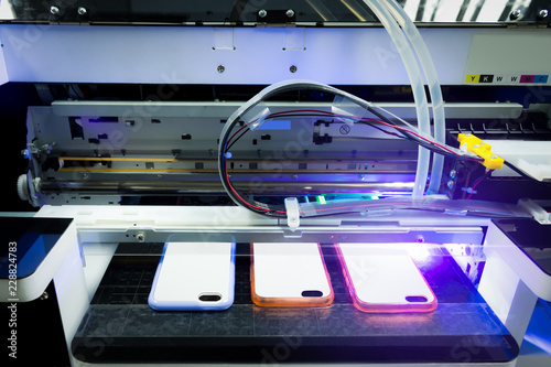 Digital uv printer laser machine for print your smart phone business. photo