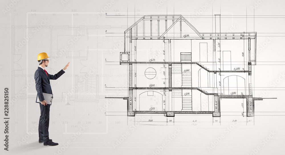 Architect watching a 2 dimension house plan
Architect watching a 2 dimension house plan