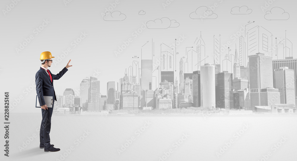 Young supervisor architect standing and replanning a big city panorama
Young supervisor architect standing and replanning a big city panorama