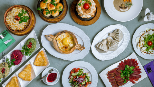 Georgian cuisine foodset from khachapuri, khinkali, pkhali, dolma, satsivi top view