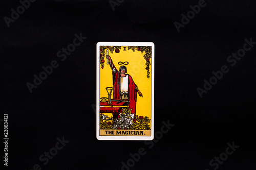 An individual major arcana tarot card isolated on black background. The Magician.
