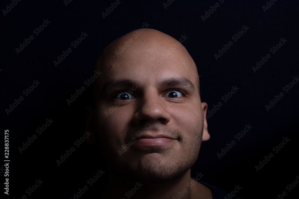 Portrait of Bald Man on Black Background Portrait of Bald Man on Black Background