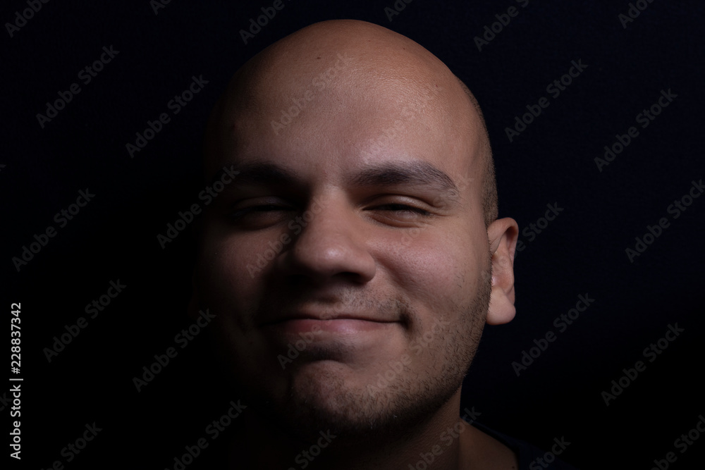 Portrait of Bald Man on Black Background Portrait of Bald Man on Black Background
