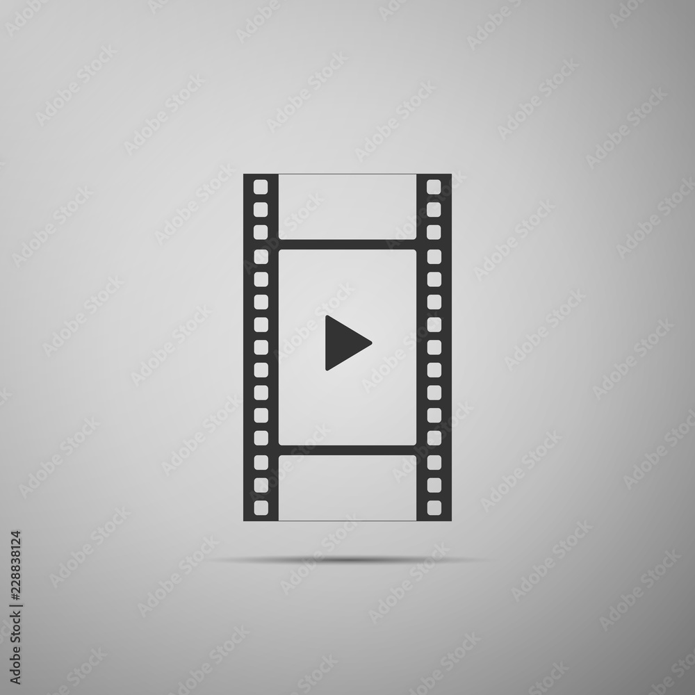 Play Video icon isolated on grey background. Film strip with play sign. Flat design. Vector Illustration
