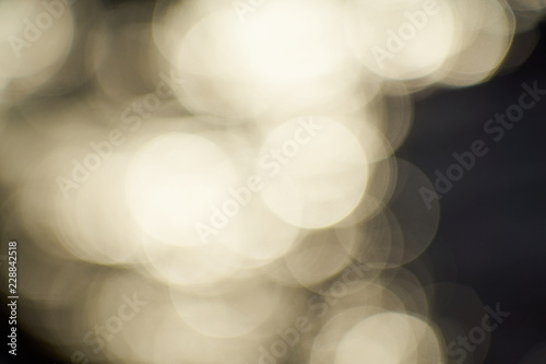 Abstract blurred bokeh of sunlight on water with pastel tone color background.                  