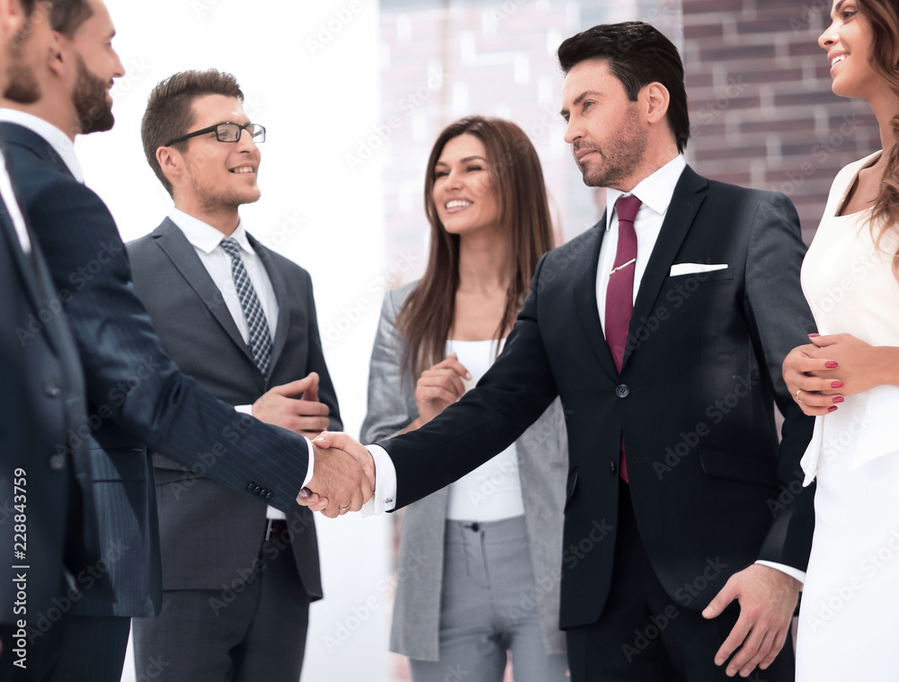 successful business partners shaking hands successful business partners shaking hands