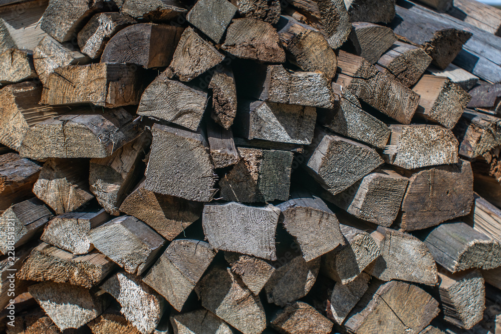 a stack of chopped firewood lies in the yard a stack of chopped firewood lies in the yard