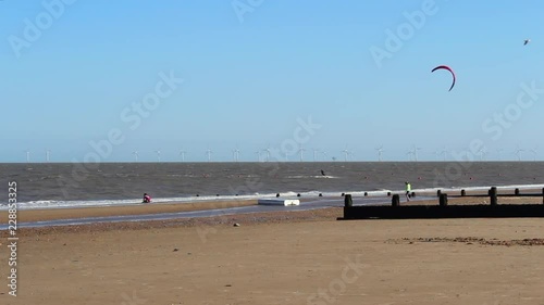 kitesurfing in a empty picturesque beach