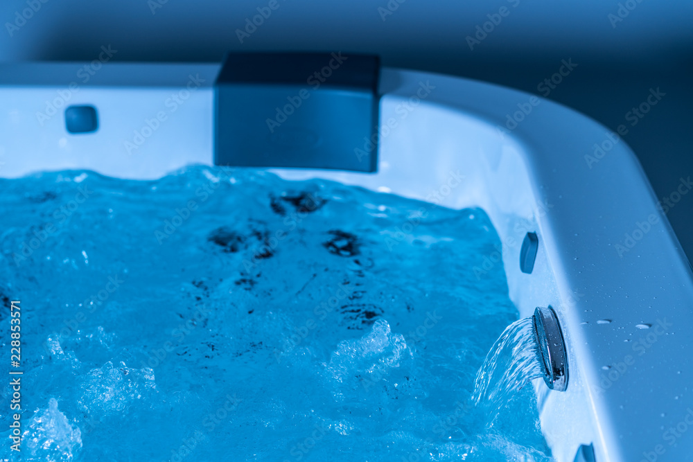 Wasser im Whirlpool, Jacuzzi, blaues Wasser mit Wellen, Wellness, Urlaub Stock Photo Adobe Stock