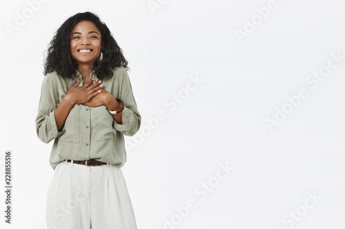 Obraz na plátně Charming charismatic and delighted cute african american young mom with curly ha
