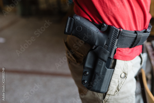 Canvas Print Close Up on Gun In Holster