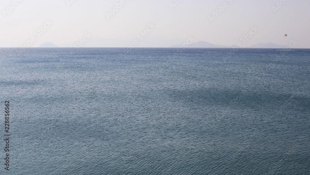 Fototapeta premium Quiet Waves On Vast Sea Horizon.