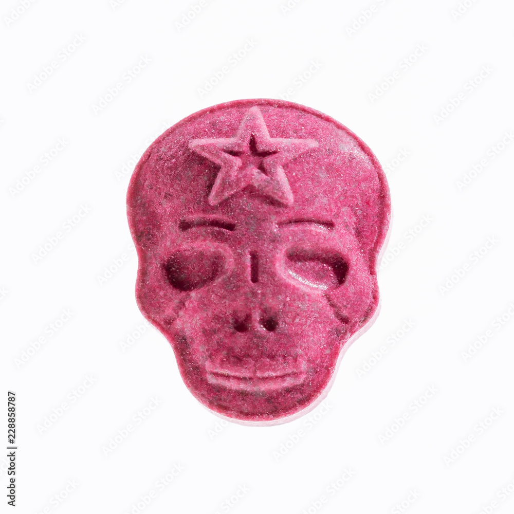 Red Army Skull, or medication pills shaped like a skull isolated on a white background. | Adobe Stock