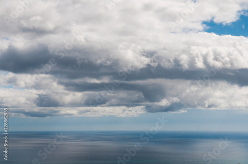 white clouds and blue sea © Дмитрий Абрамов