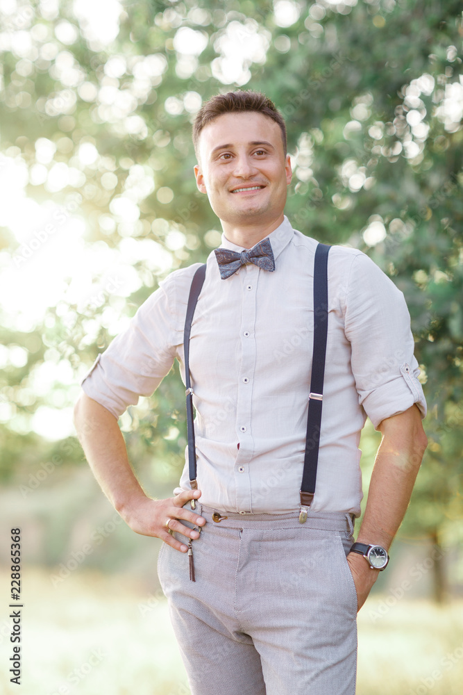 Portrait of a young handsome groom outdoors. Portrait of a young handsome groom outdoors.