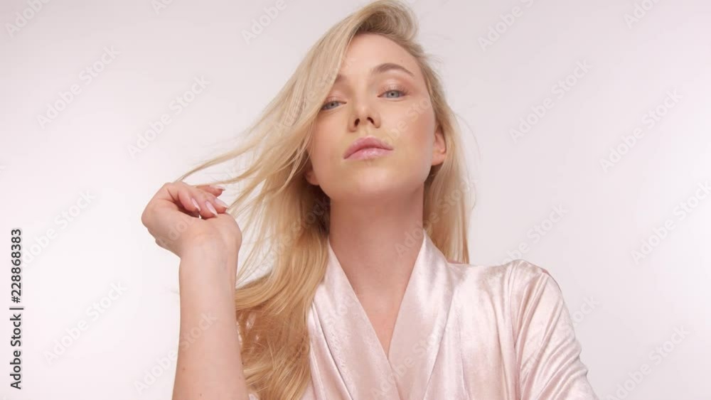 slowmotion of nordic model in studio with streaming blowed hair slowmotion of nordic model in studio with streaming blowed hair