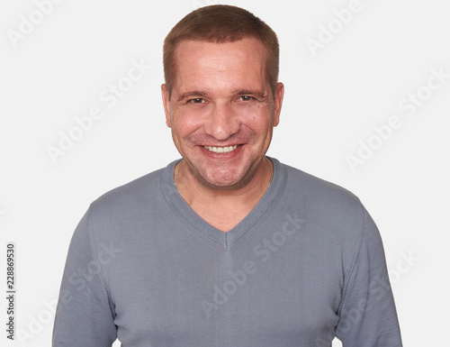 portrait of a cheerful man looking at camera isolated © spaxiax