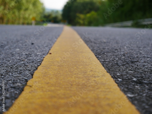 asphalt road with red lines